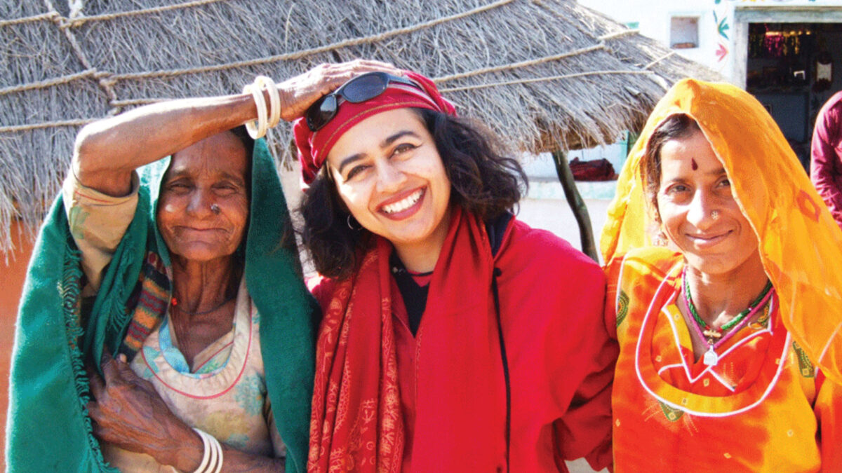 three women wearing Indian garments