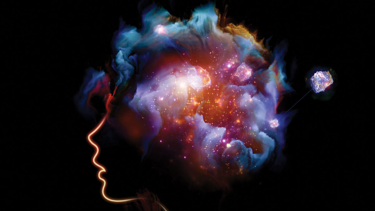 an illustration of an outline of a person's head with the galaxy coming out of the brain