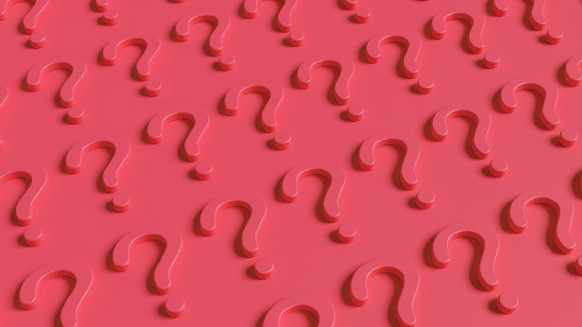 an array of pink question marks