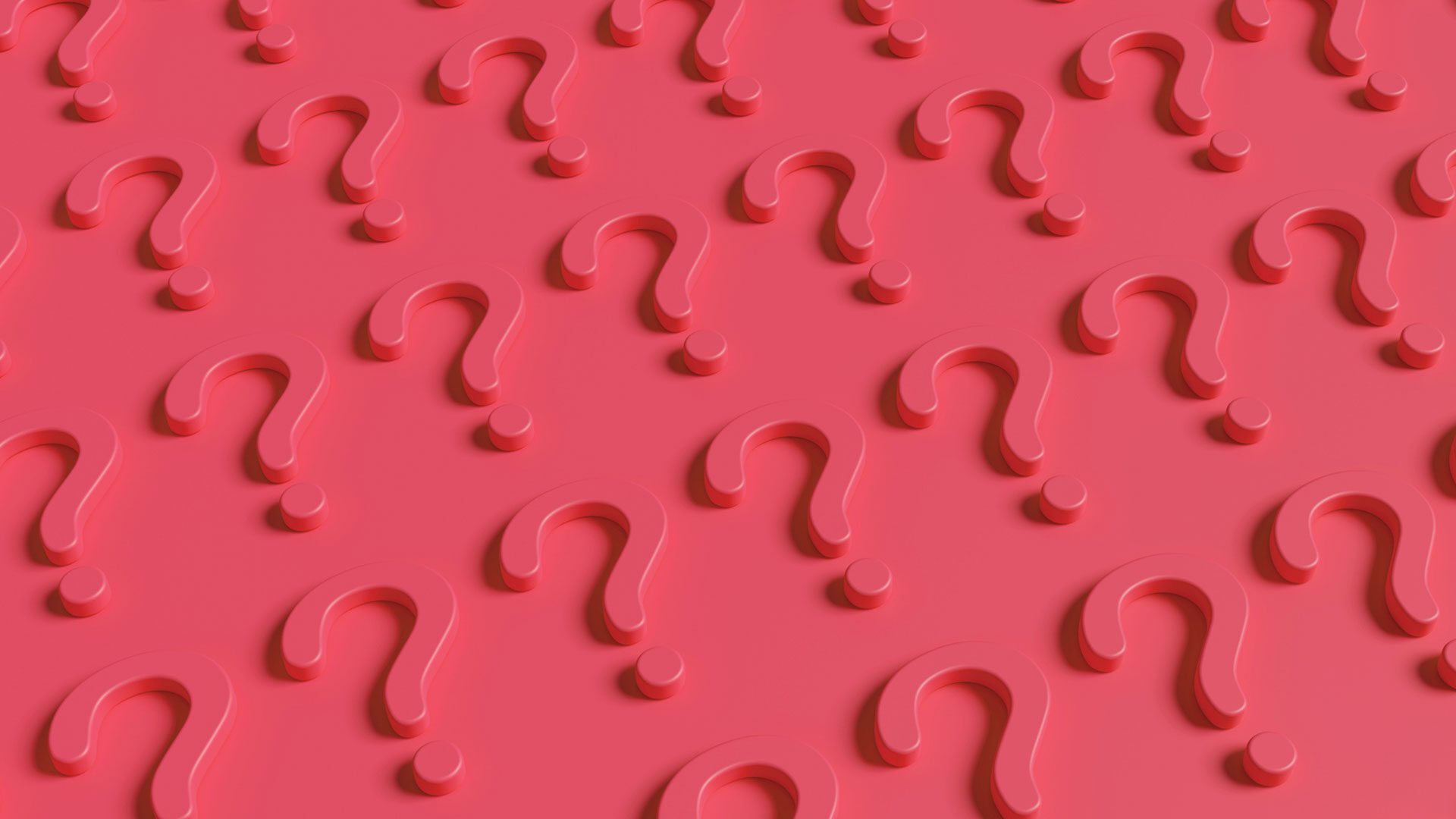 an array of pink question marks