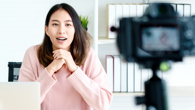 a worker on camera in a home office