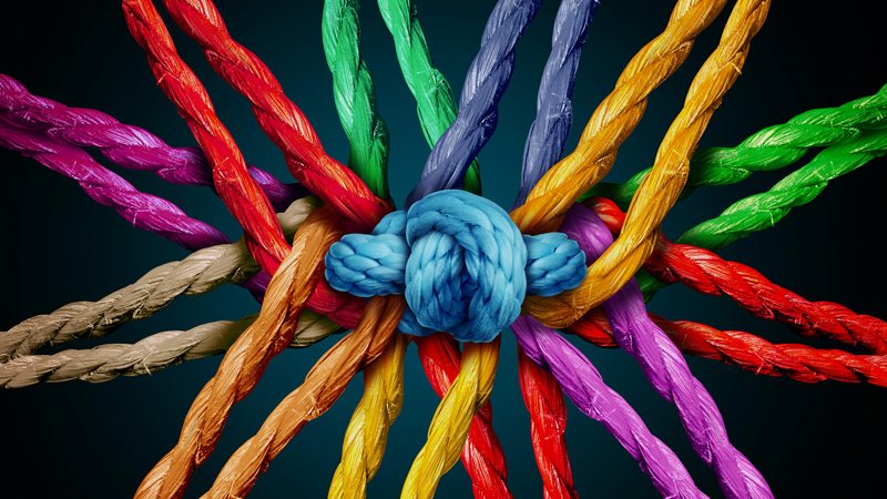 An artist interpretation of different colored rope tied together to depict attachment.