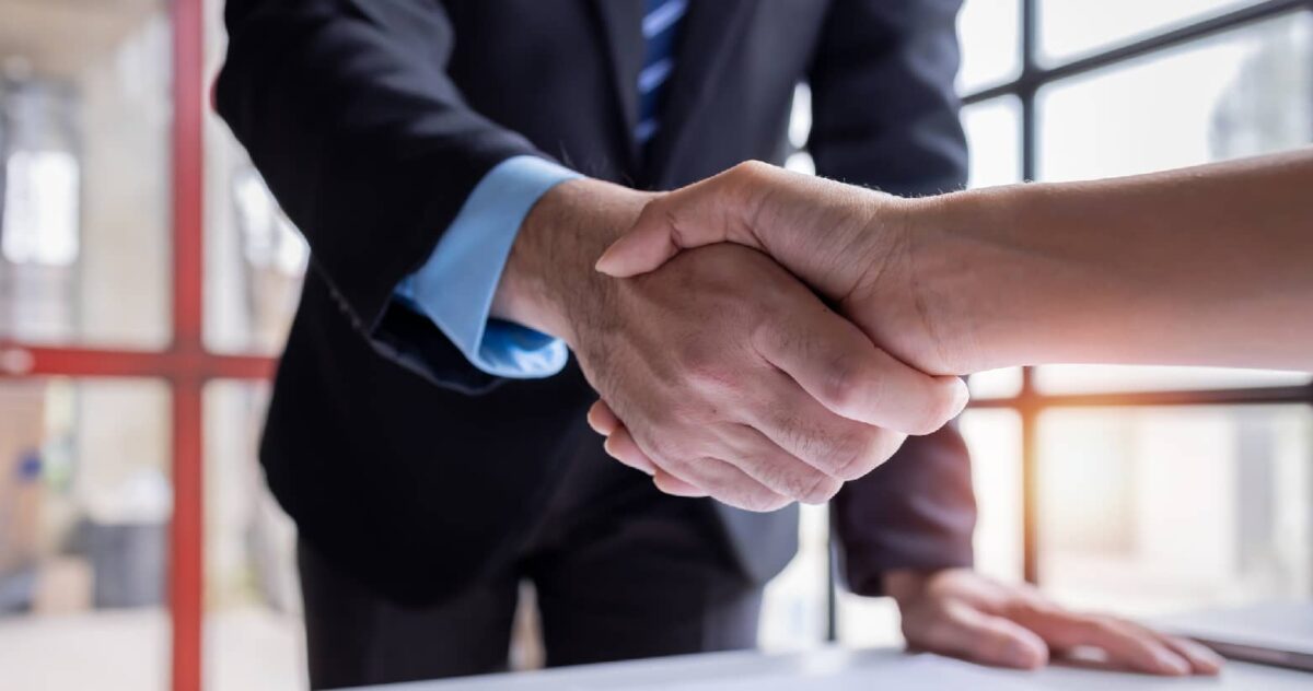 Two people shaking hands