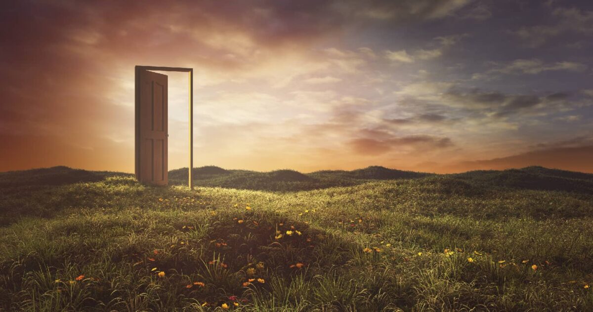 open door in a grass field 