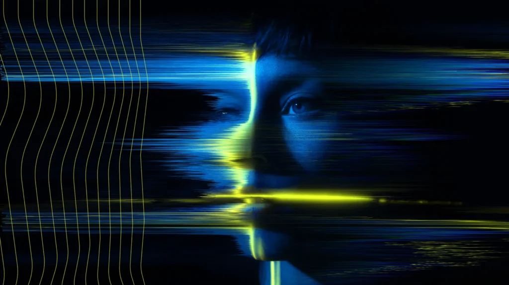 A human face artistically rendered with wave motions as if the face was produced digitally