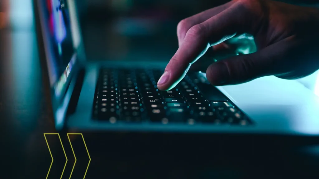 A hand over a keyboard