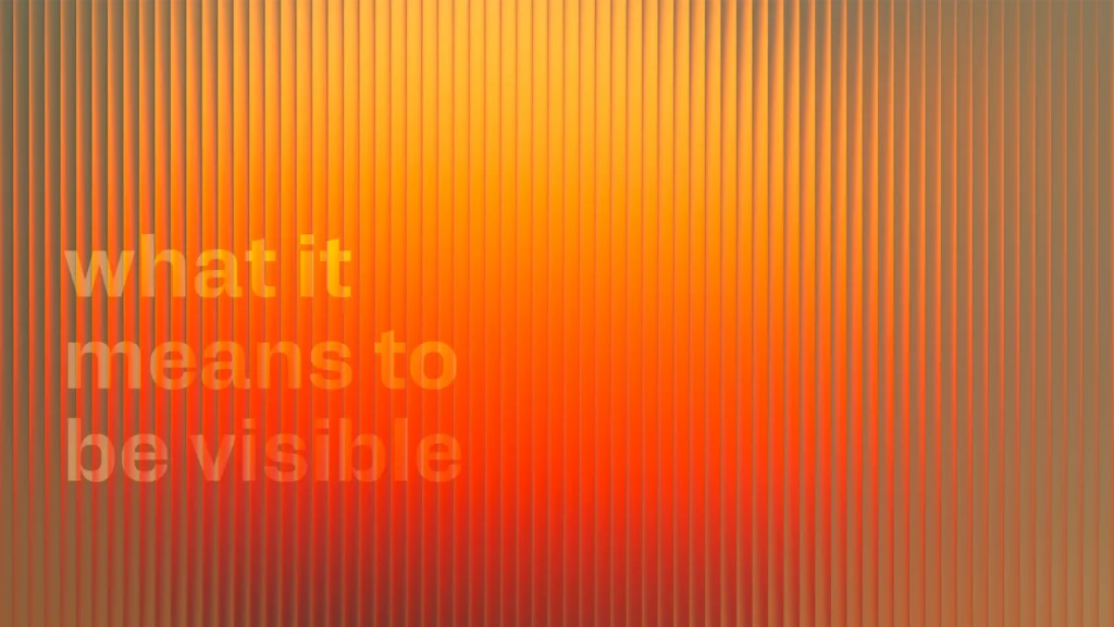 Abstract orange and yellow gradient with vertical lines and the words “What it means to be visible,” illustrating how brands achieve visibility in AI-powered search.